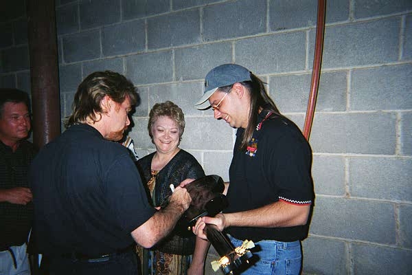 Leeroy Parnell signing Billy Blazes guitar